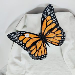 Papillon en céramique orange et noir
