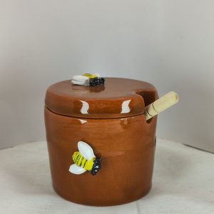 Pot à miel avec cuillère